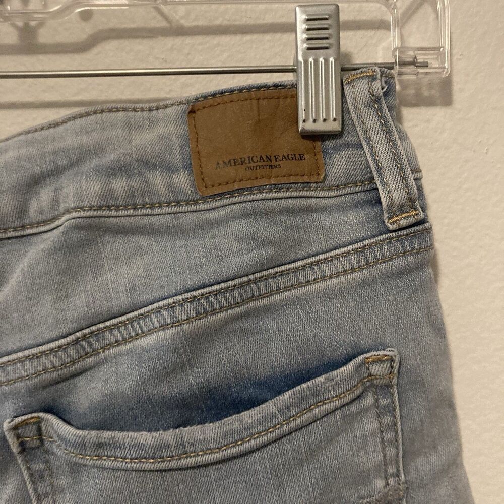 AMERICAN EAGLE OUTFITTERS Next Level Stretch light wash zip fly cut off shorts 6 - Picture 10 of 12